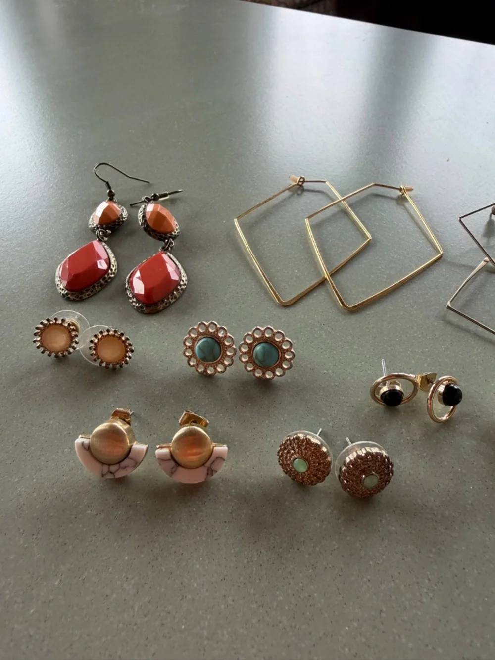 Lot - 9 pairs stud and dangle statement earrings